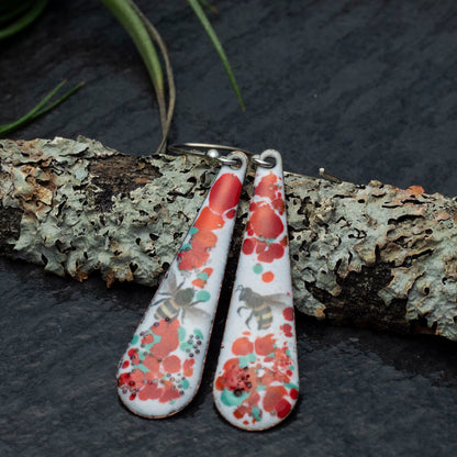 Enamel bee earrings with floral splatter and sterling silver ear wires