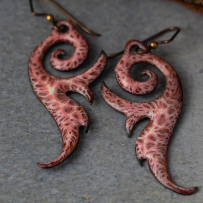 Handmade seaform curl earrings in kiln-fired enamel on copper with niobium ear wires. Lightweight, sculptural, and nature-inspired.