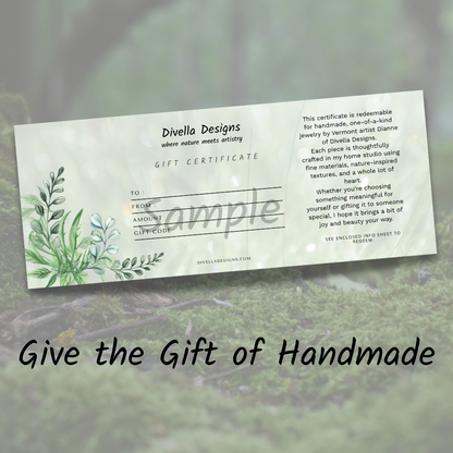 Gift certificate from Divella Designs with green leaf design on a blurred natural background
