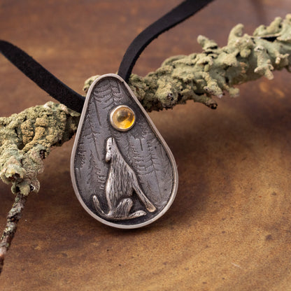 Sterling silver wolf pendant with golden citrine on adjustable black leather lace