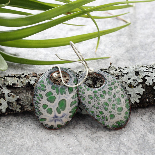 Handmade enamel teardrop dangle earrings in green and cork, nature-inspired jewelry on copper with sterling silver ear wires