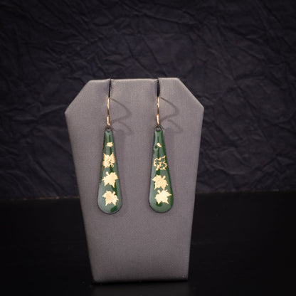 Green enamel teardrop earrings with 24k gold maple leaf design and 14k gold-filled ear wires, handcrafted nature-inspired jewelry.