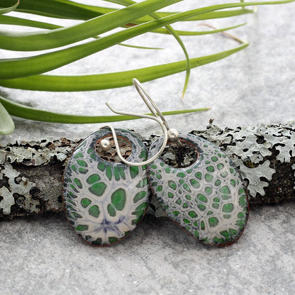 Handmade enamel teardrop dangle earrings in green and cork, nature-inspired jewelry on copper with sterling silver ear wires