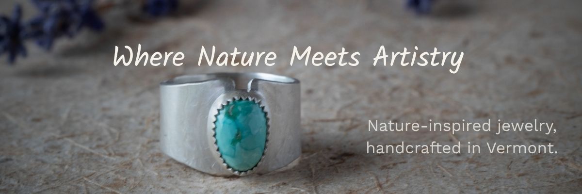 Silver ring with turquoise stone on a textured surface, with text 'Where Nature Meets Artistry' and 'Nature-inspired jewelry, handcrafted in Vermont.'.