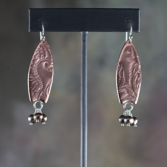 handmade copper earrings with fish and wave impressions, freshwater pearls, and sterling silver ear wires, ocean-inspired artisan jewelry