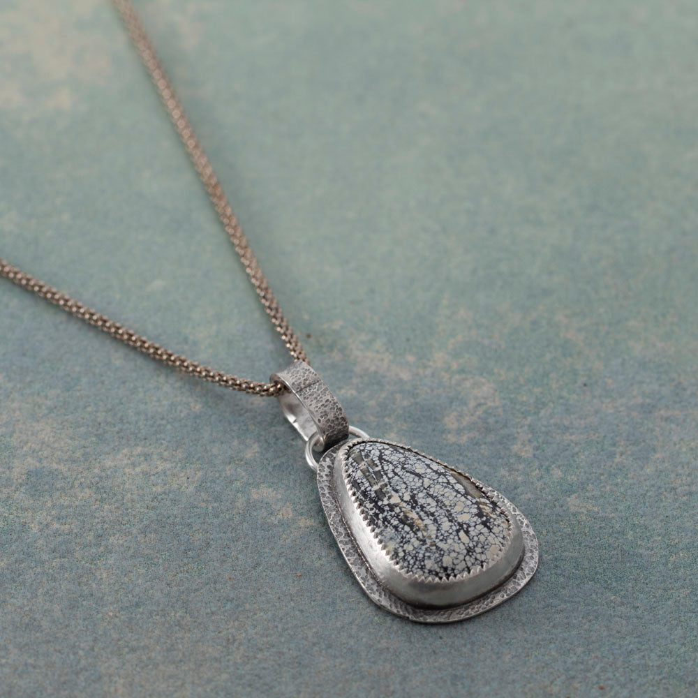 Handmade sterling silver Ivory Creek Variscite necklace with textured silver backplate and bail. Nature-inspired pendant on an 18" sterling silver popcorn chain.