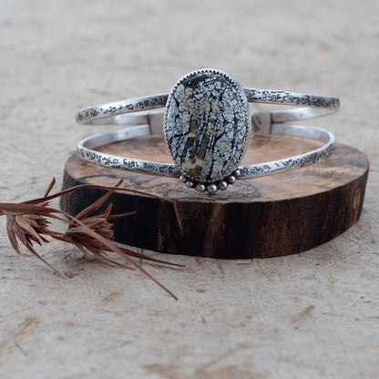 Sterling silver cuff bracelet with textured double bands and an oval Ivory Creek Variscite stone set in silver.