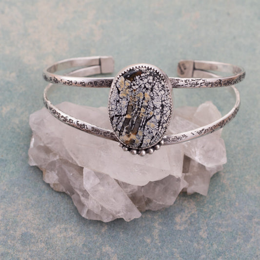 Sterling silver cuff bracelet with textured double bands and an oval Ivory Creek Variscite stone set in silver.