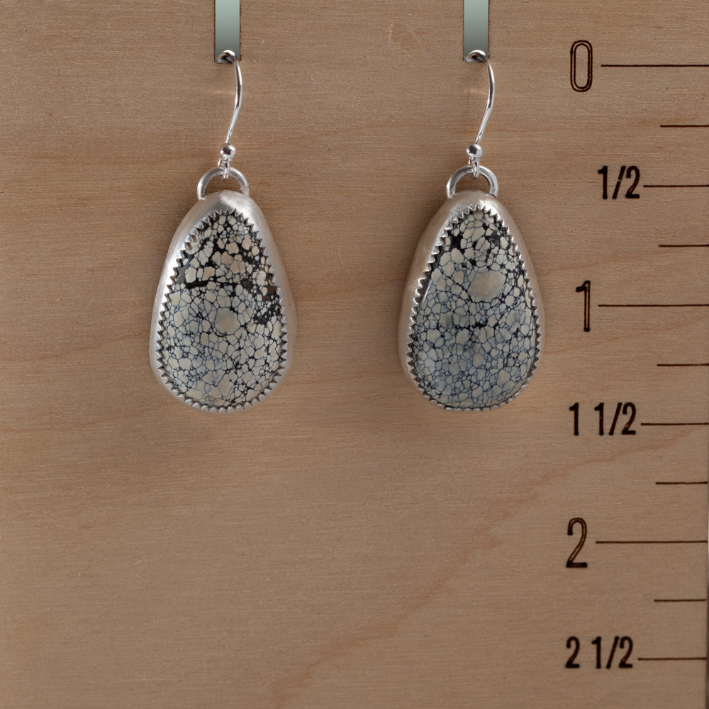 Ivory Creek Variscite sterling silver teardrop earrings shown on a wooden measurement board