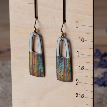 Ivory enamel rectangular earrings with open cutouts, colorful striped details, and niobium ear wires.