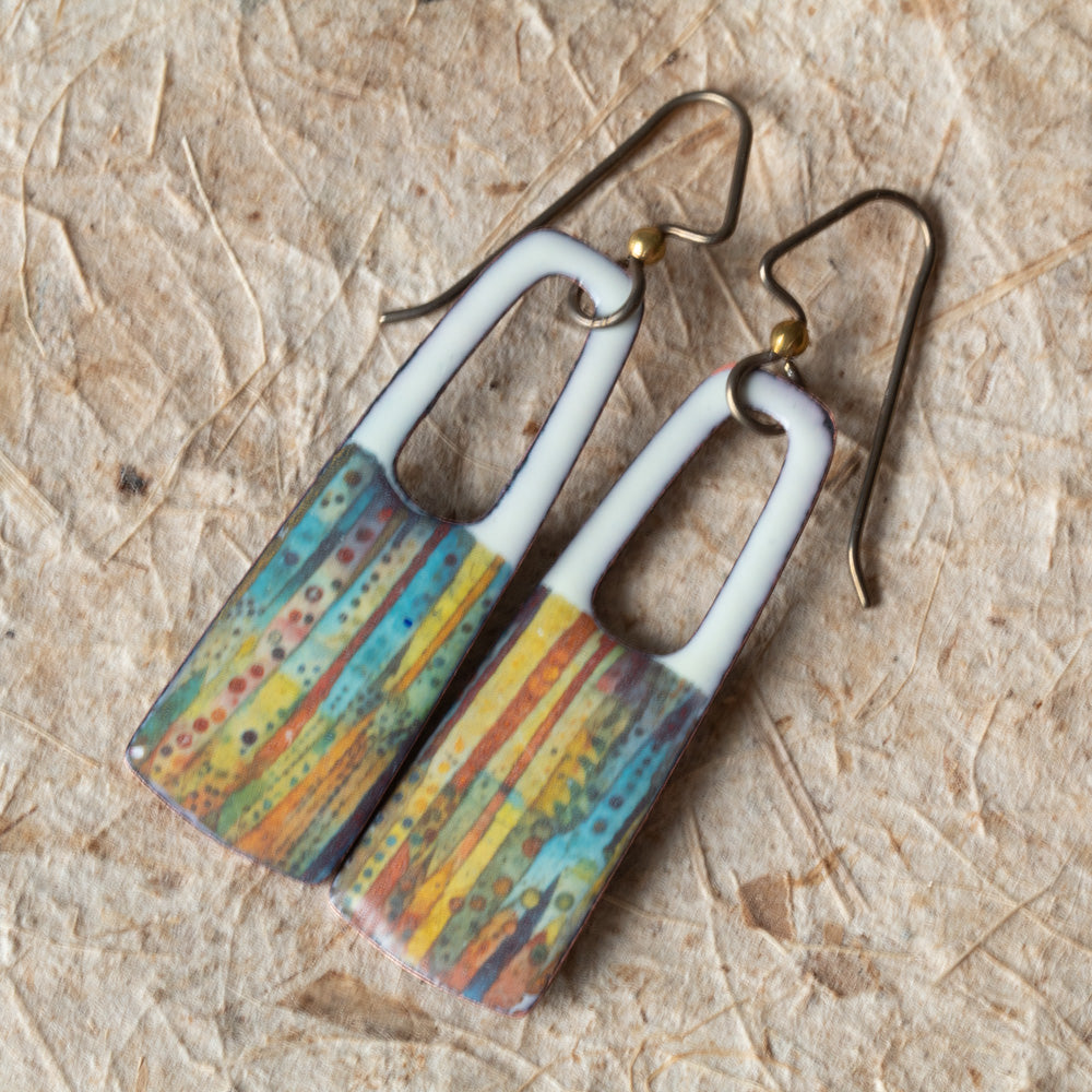 Ivory enamel rectangular earrings with open cutouts, colorful striped details, and niobium ear wires.