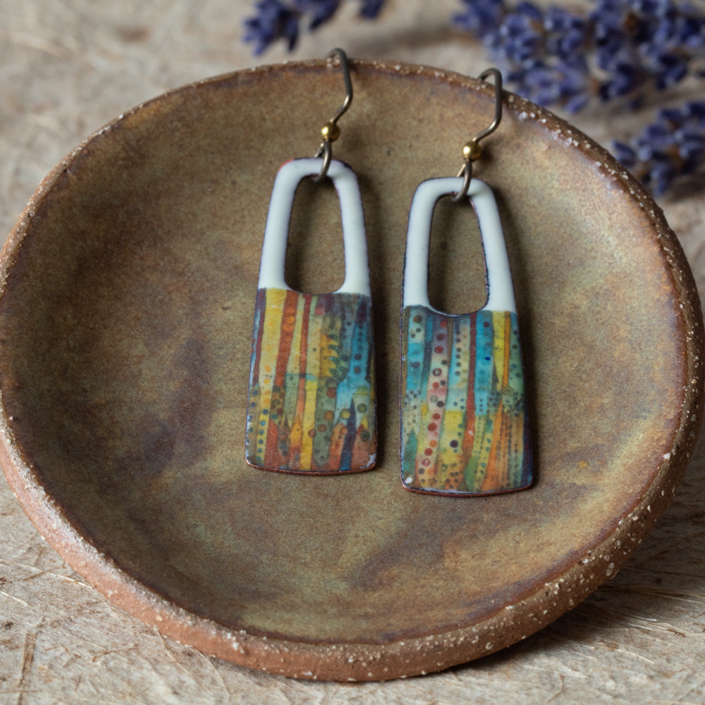 Ivory enamel rectangular earrings with open cutouts, colorful striped details, and niobium ear wires.