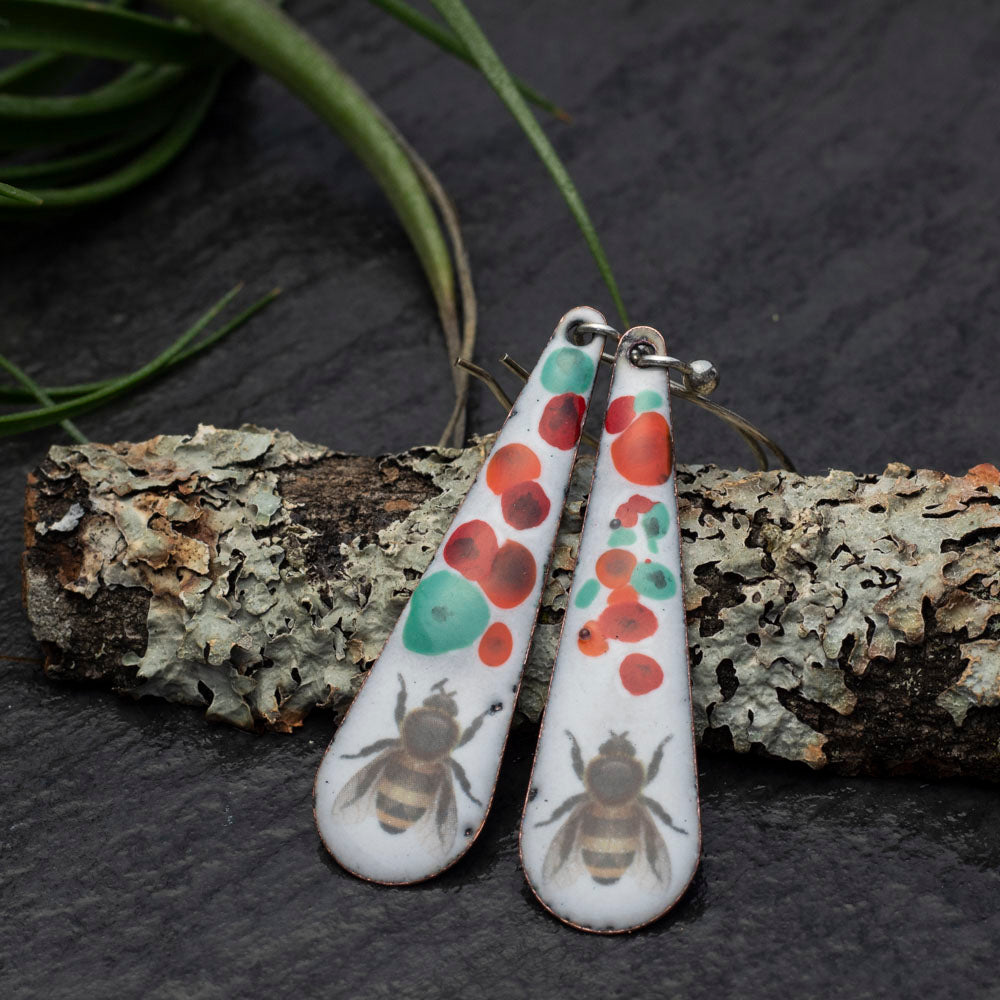 Enamel bee earrings with floral splatter and sterling silver ear wires