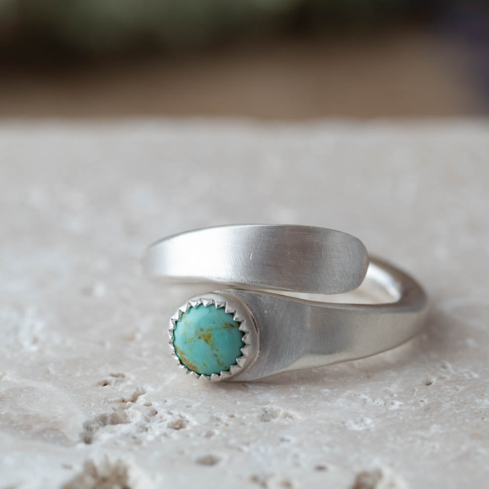 Handmade sterling silver wrap ring with 6mm Kingman turquoise and satin finish exterior