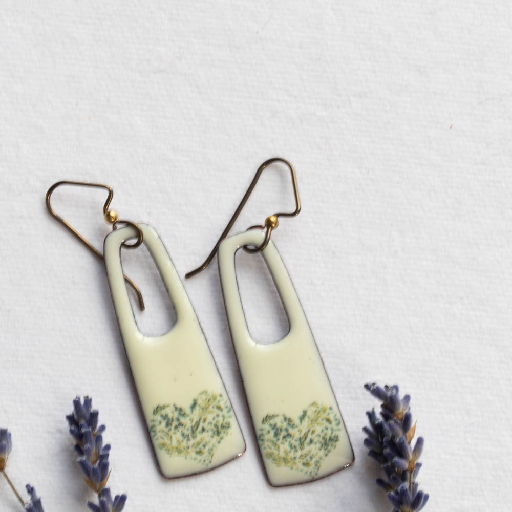 Light green rectangular enamel earrings with botanical heart detail, handmade in Vermont by Divella Designs