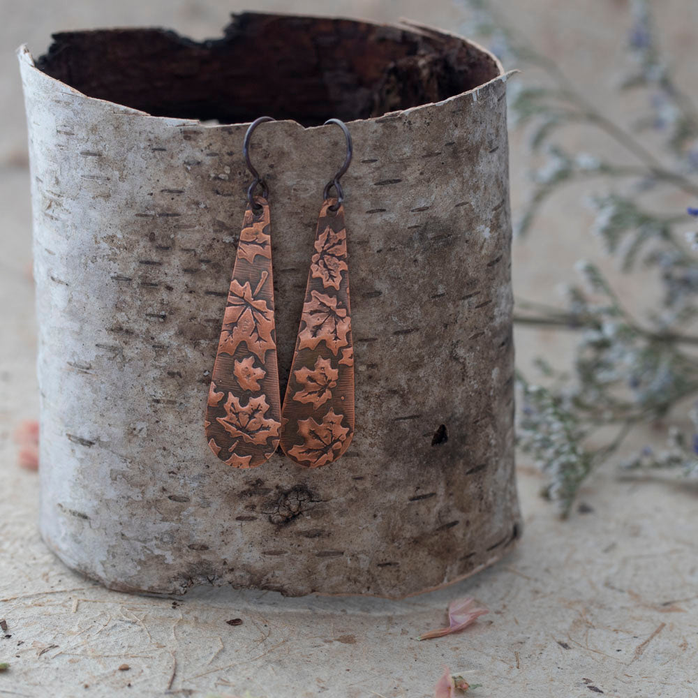 Handmade copper teardrop earrings with maple leaf impression, nature-inspired Vermont jewelry by Divella Designs