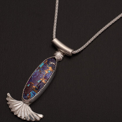 Close up view of  Purple Mohave gemstone pendant, artisan nature-inspired jewelry