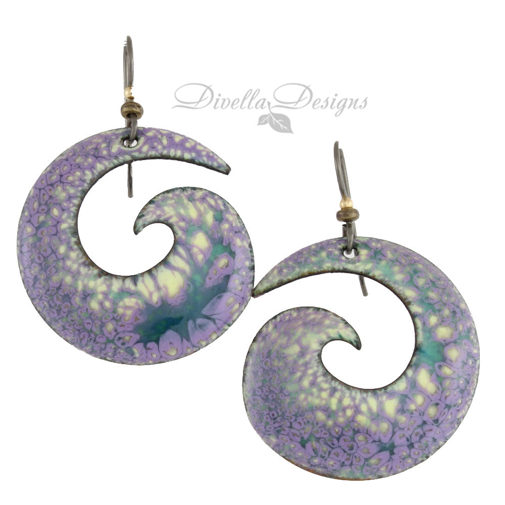 Purple, yellow, and blue enamel spiral earrings with organic floral texture and niobium ear wires, handmade by Divella Designs.