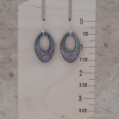 Oval enamel earrings for scale