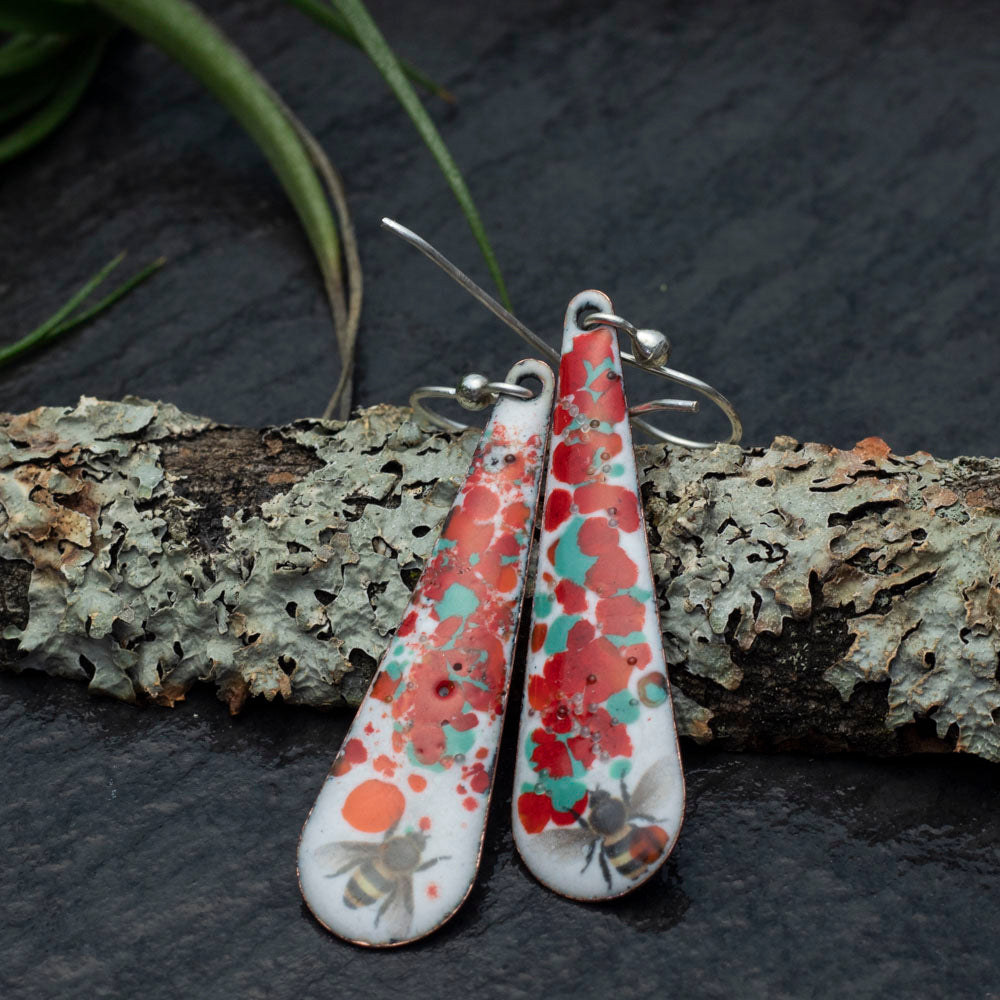 Enamel bee earrings with floral splatter and sterling silver ear wires