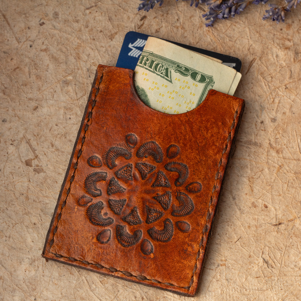 Handmade leather card case with rustic mandala design. Offered as a second due to stamping irregularities. Handmade in Vermont.