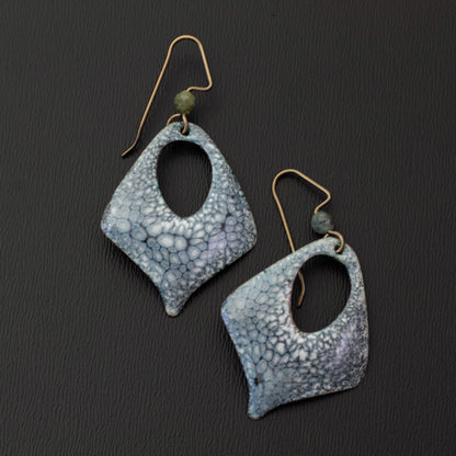 Close-up of smoky gray-blue kiln-fired enamel earrings with soft green genuine tourmaline accents and open diamond drop shapes.