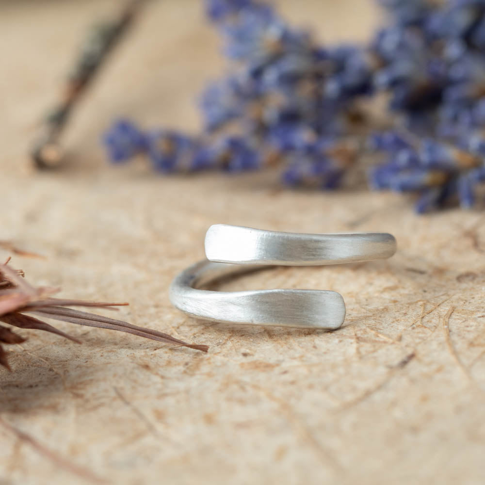 satin finish silver wrap ring modern curved design