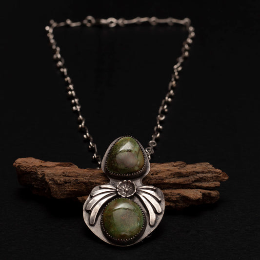 Handmade sterling silver necklace with Sonoran turquoise stones and handmade chain.