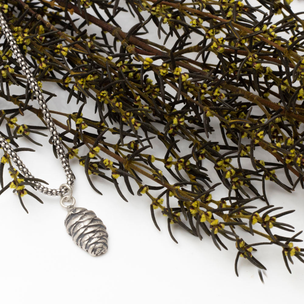 Solid sterling silver pine cone pendant on oxidized bead chain