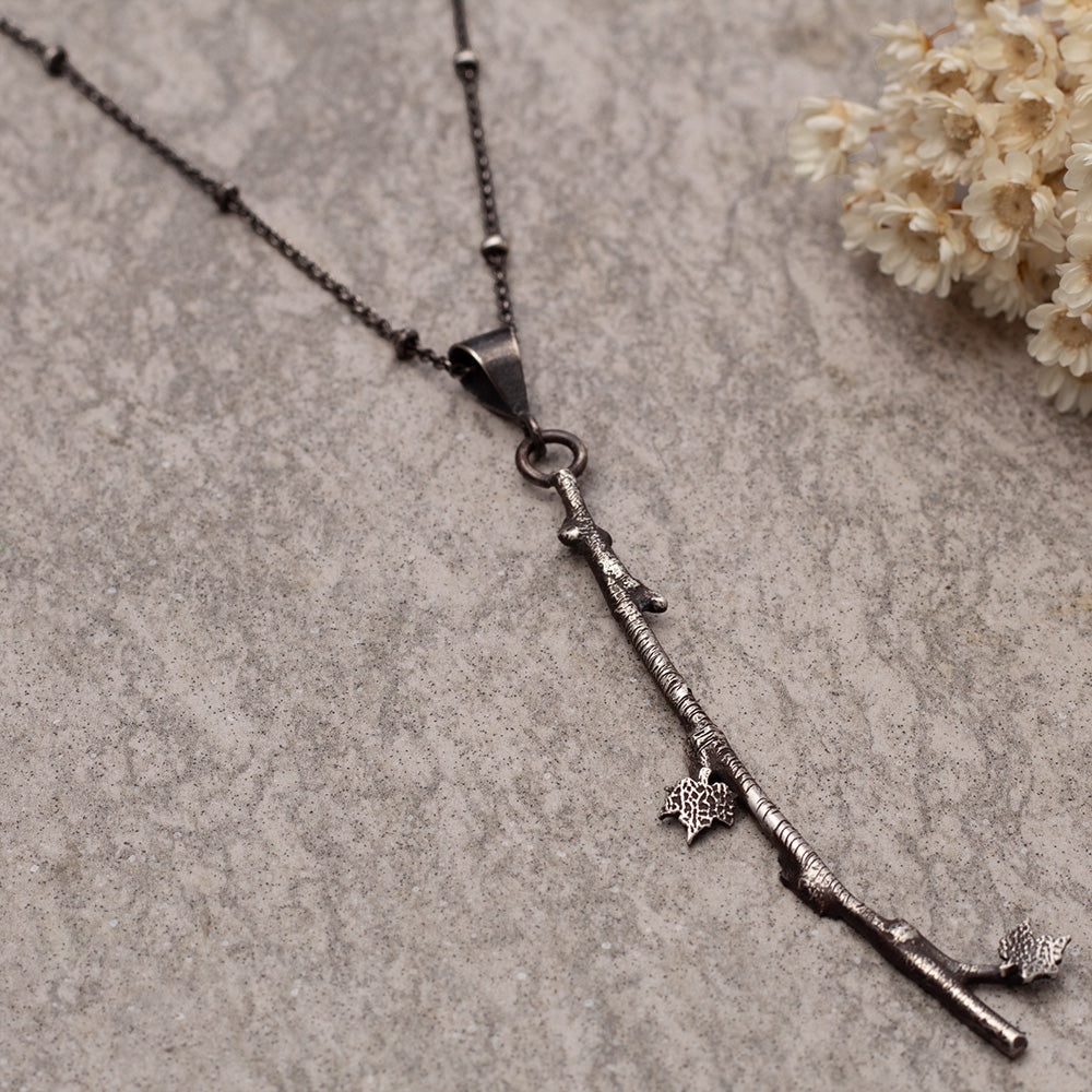 Sterling silver branch necklace with maple leaf charms on a beaded 18-inch oxidized chain,