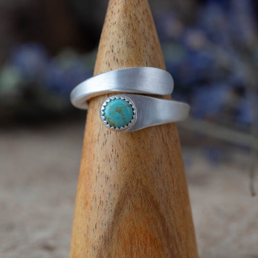 Sterling silver adjustable ring with Kingman turquoise cabochon, handmade in Vermont.