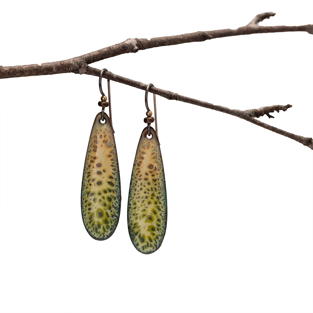 Yellow and green enamel copper earrings with teardrop shape and lichen-inspired pattern, handmade by Divella Designs in Vermont.