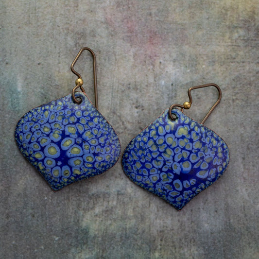 Handmade blue enameled copper earrings with lichen-inspired yellow and turquoise pattern, diamond shape with hypoallergenic niobium ear wires.
