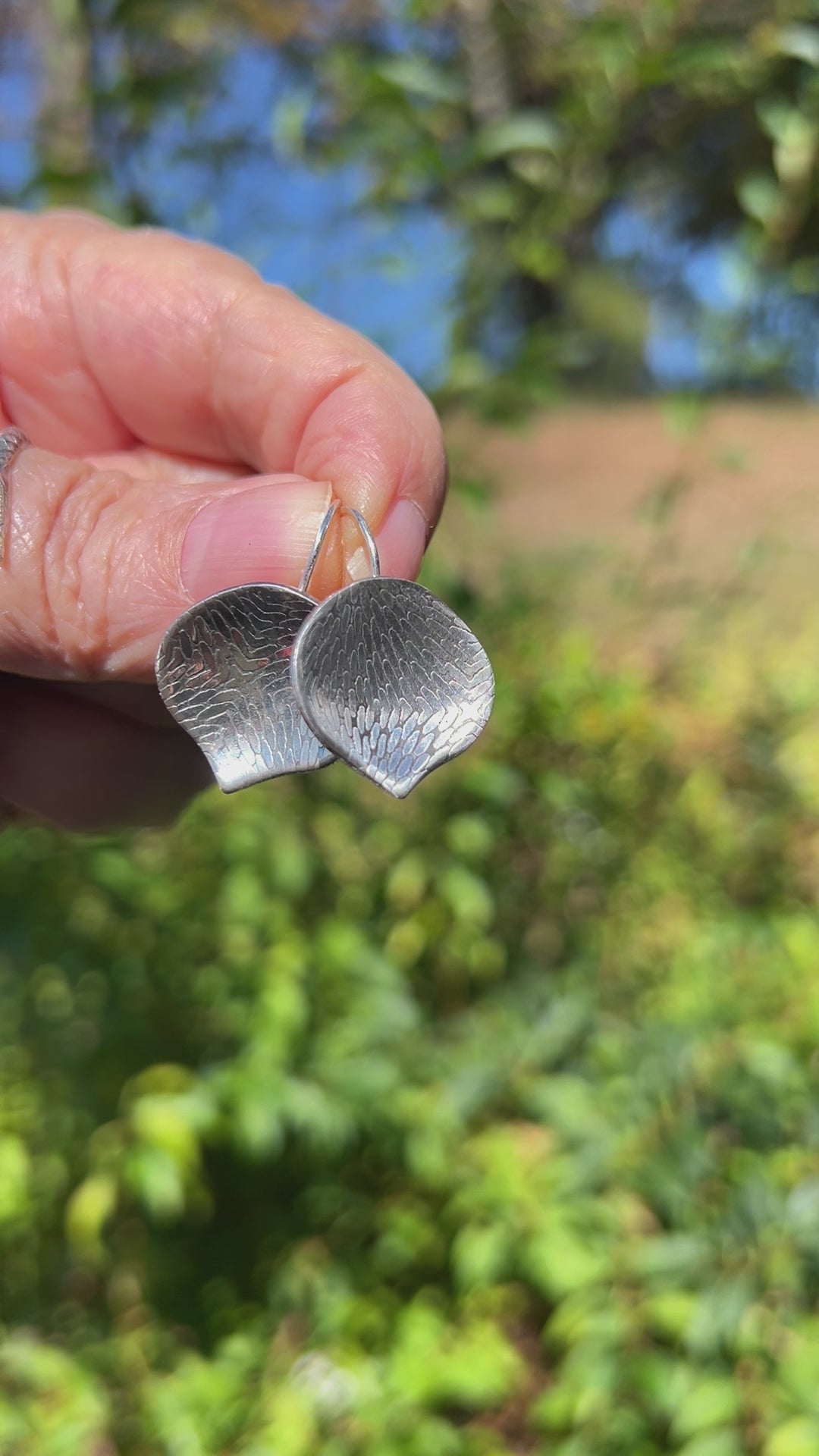 video of petal catch earrings