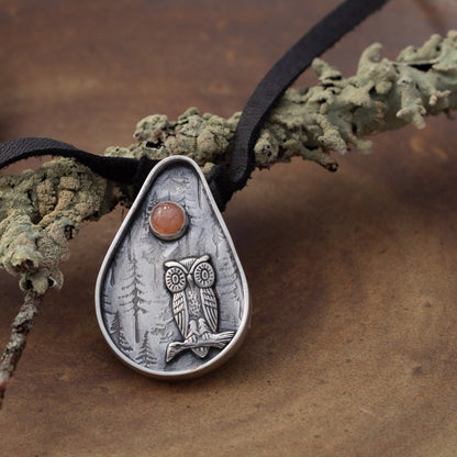 Sterling silver owl pendant with Oregon sunstone on adjustable black leather lace