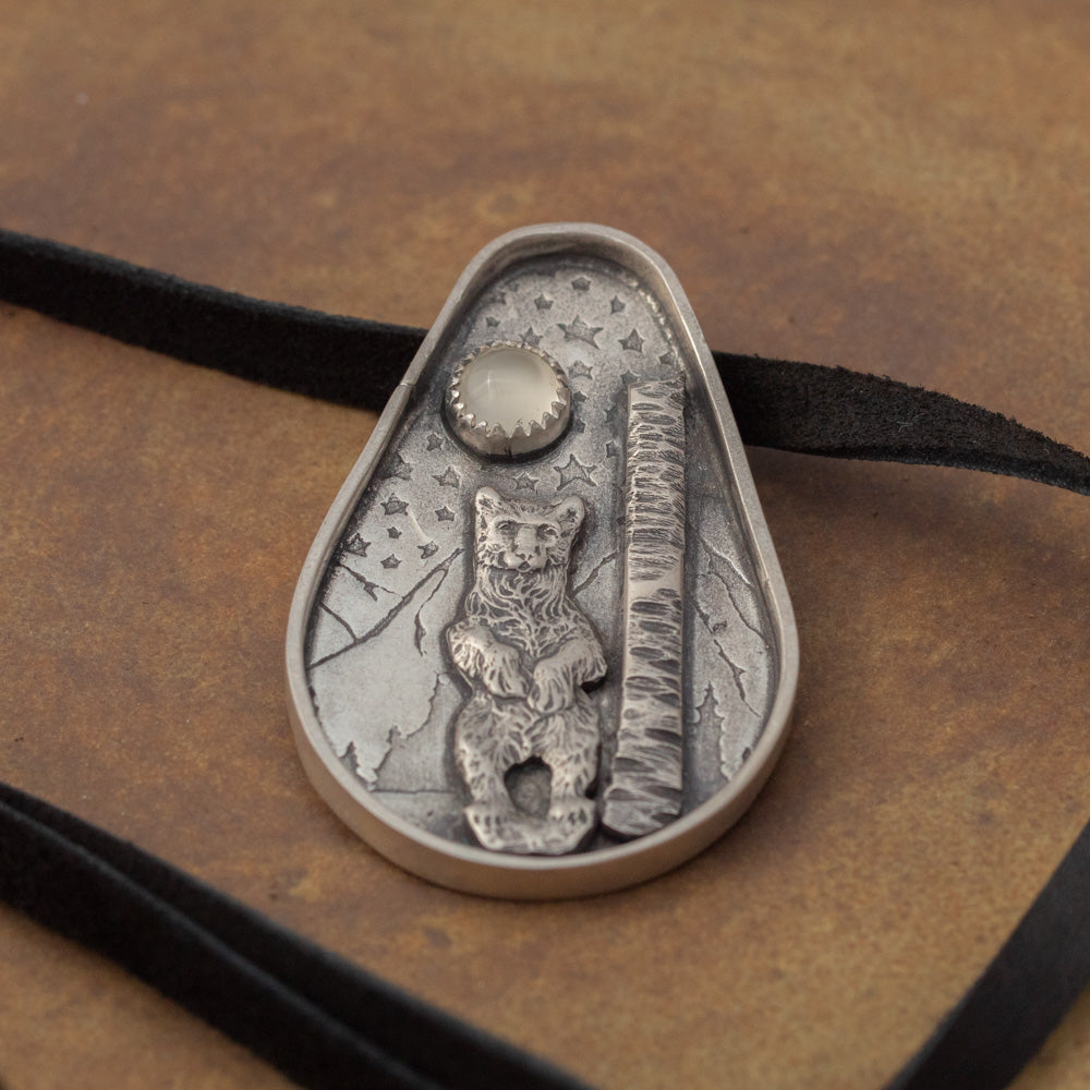 Handmade sterling silver standing bear pendant with moonstone and starry night details