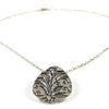 silver necklace with leaves
