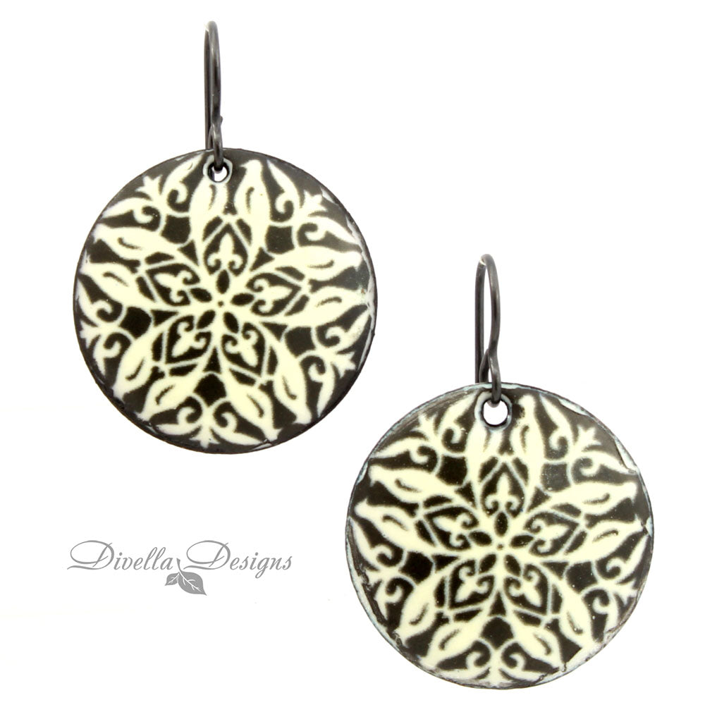 Celtic design earrings in cream and black