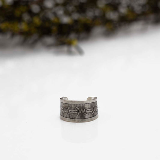 Sterling silver ear cuff with barbed wire engraving and matte finish