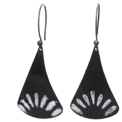 Black enamel boho-style earrings with flared teardrop shapes, featuring a white sunburst pattern along the bottom edge and oxidized sterling ear wires.