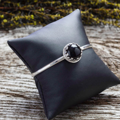 Sterling silver cuff bracelet with 14mm black onyx cabochon in gallery bezel, handcrafted in Vermont, 6-inch length with 1-inch gap.