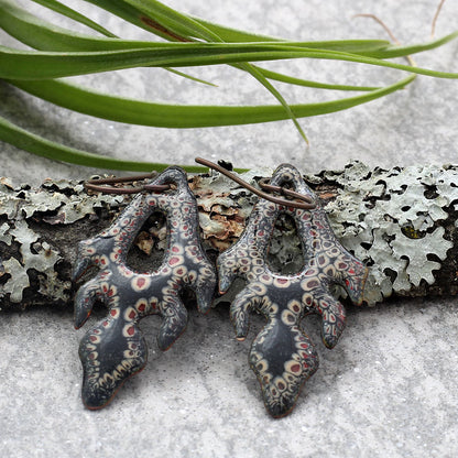  Black and red patterned enamel earrings with niobium ear wires and organic flame-like shape