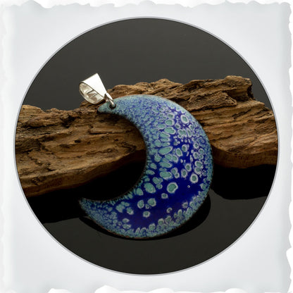 Blue enamel crescent-shaped pendant with sterling silver bail handmade in Vermont