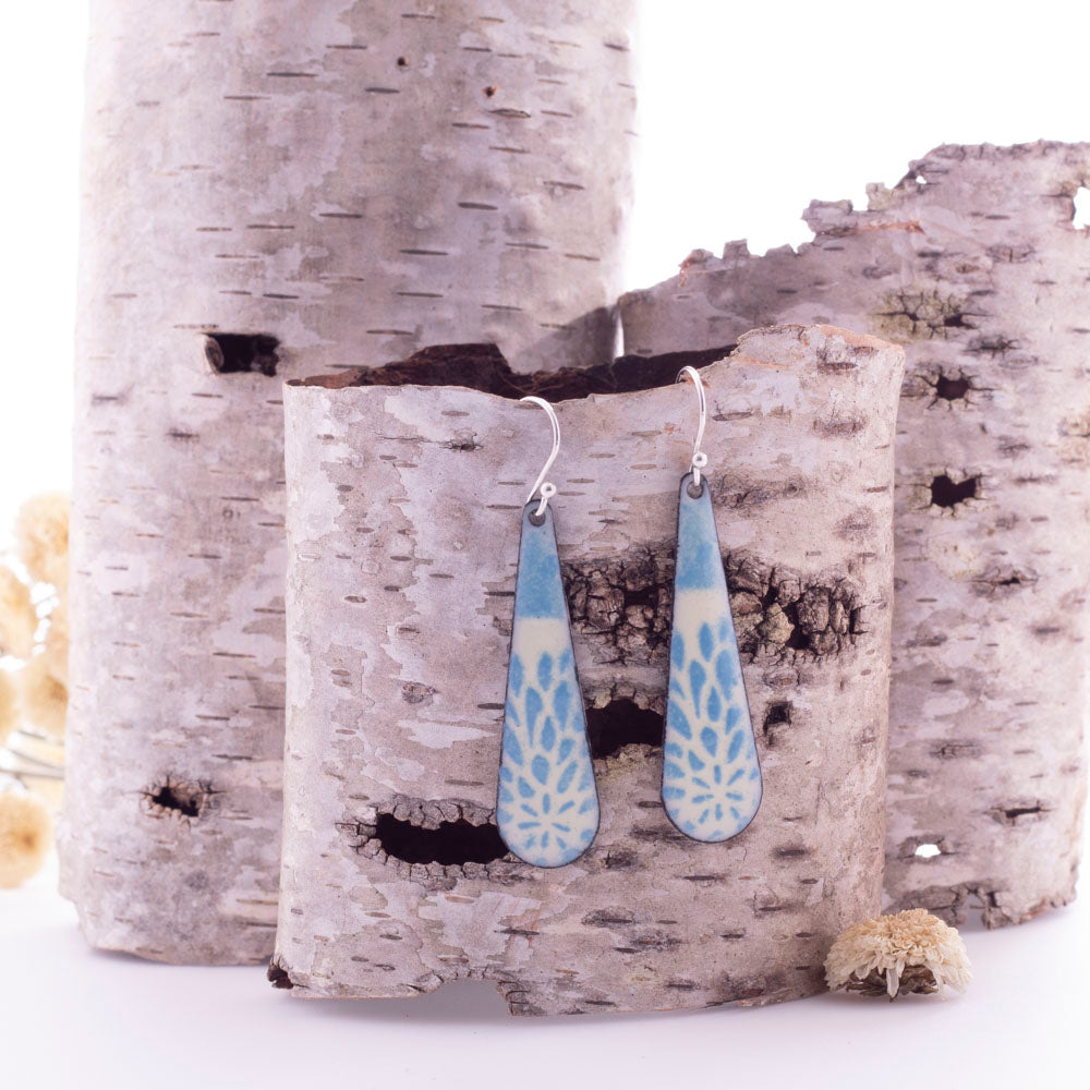 Blue and ivory rectangle earrings with floral pattern handmade in Vermont with kiln-fired enamel on copper and sterling silver ear wires.