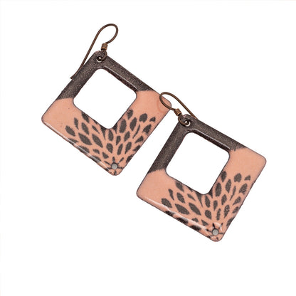 Geometric pink enamel earrings with black petal print on square copper frames