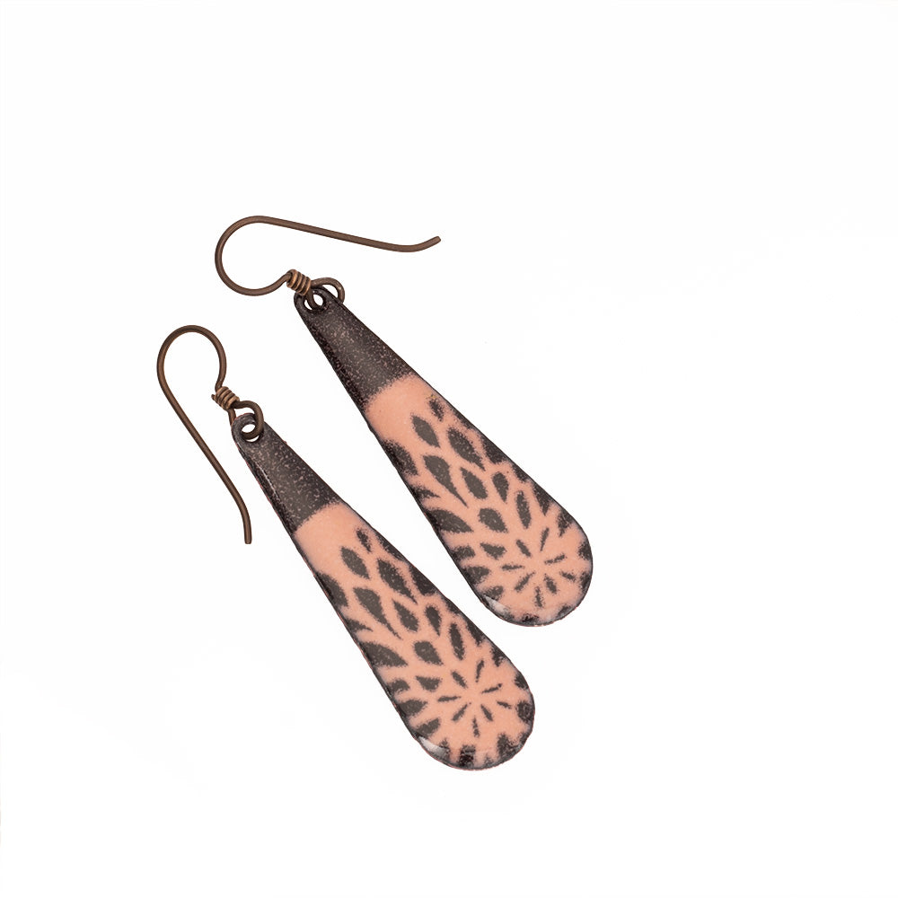 Blush and gray enamel teardrop earrings with petal-like patterning and niobium ear wires, handmade by Divella Designs.