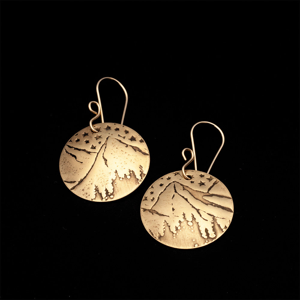 Brass mountain and stars earrings with impressed night-sky landscape, 14k gold-filled ear wires, and 1 3/8 inch length, handmade by Divella Designs in Vermont.