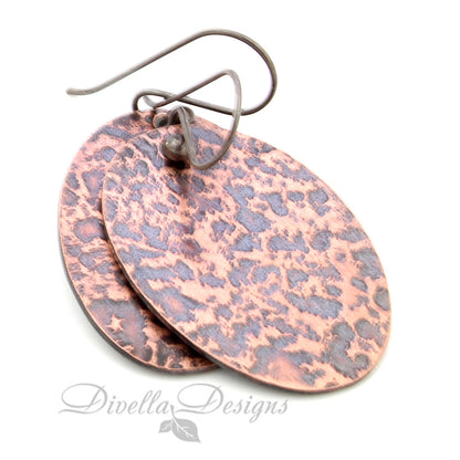Oval copper earrings with leopard-textured patina and oxidized sterling ear wires