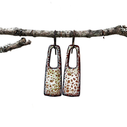 Enamel earrings with rust, ivory, and mossy green organic pattern and niobium ear wires
