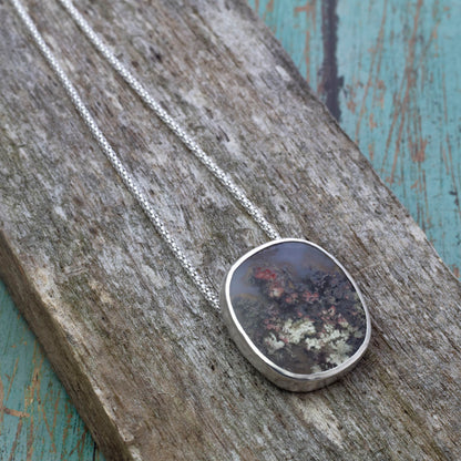 Sterling silver pendant with oval dendritic agate on 18 inch chain